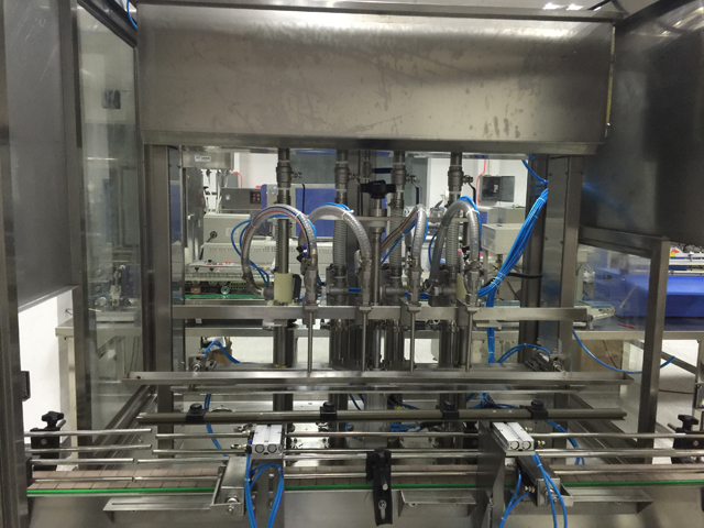 mesin pengisian empat kepala.jpg