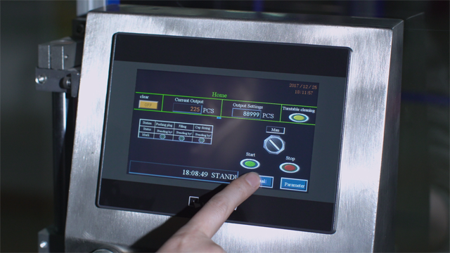 gambar mesin pengisian tutup.jpg