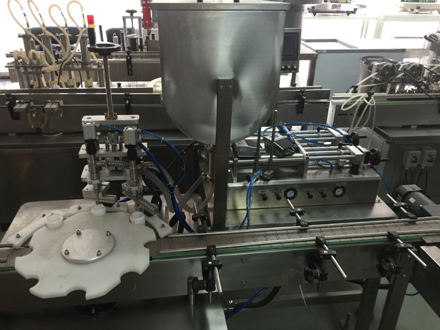 mesin pengisi dua toples.jpg