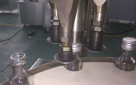 mesin_penyegel_tutup_ropp_mesin_penutup_botol_dengan_satu_h