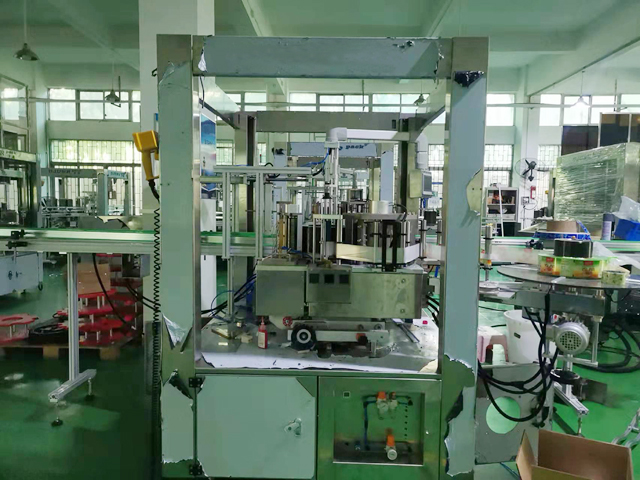 mesin pelabelan leleh panas.jpg