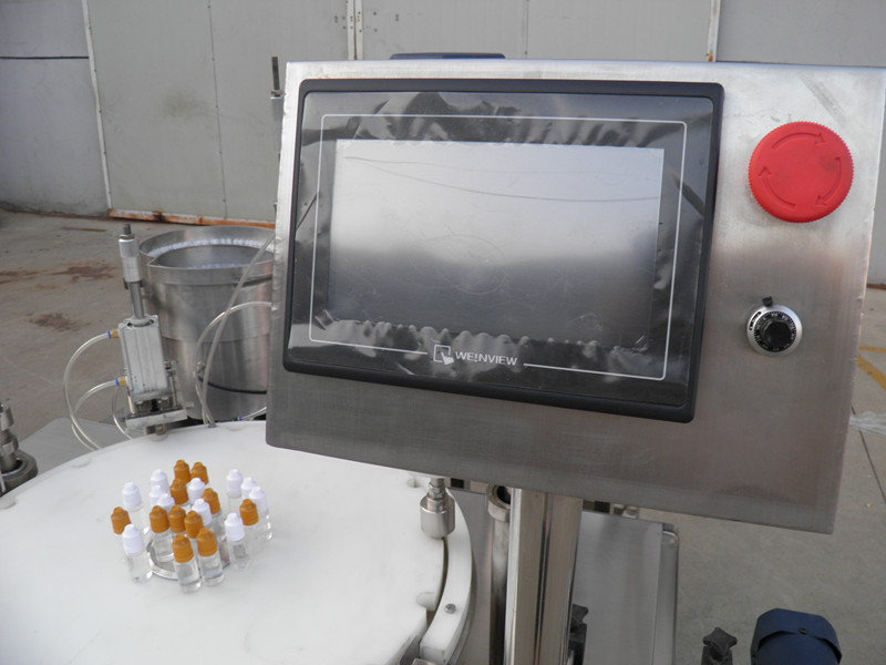 filling plugging capping labeling production line Pelabelan tutup botol PLC E-liquid.jpg