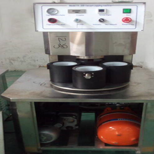 illustration of vacuum capping machine semi automatic ilustrasi untuk vacuum capping.jpg