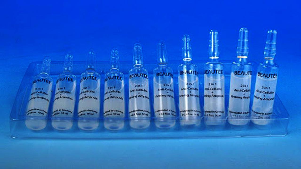 liquid solution bottles labeling machine samples final products botol ampul.jpg
