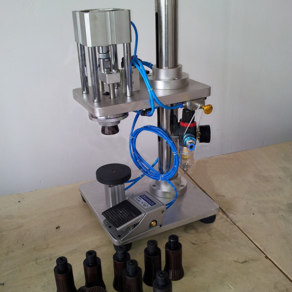 manual crimping machine for glass bottles peralatan penutup pneumatik semi otomatis pneumatik.jpg