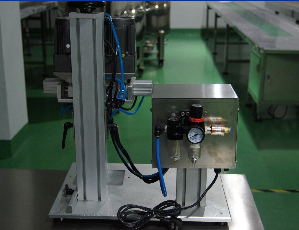 back shot of tabletop capping machine mesin penutup sekrup desktop.jpg