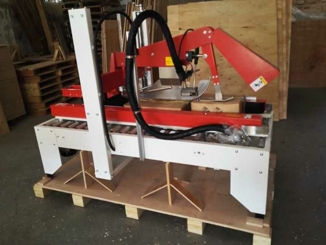 mesin penyegel karton lem panas meleleh.jpg